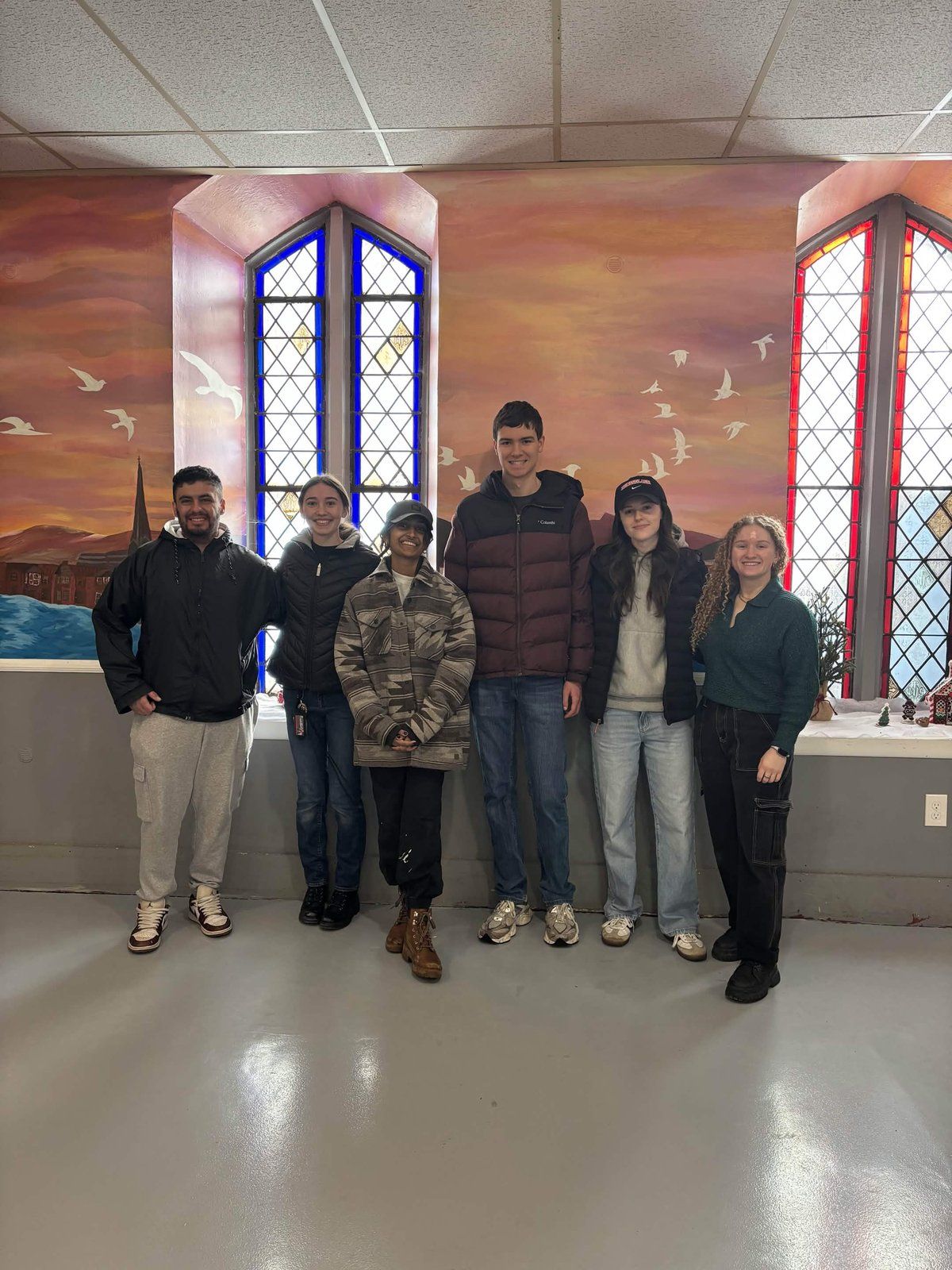 Alpha Phi Omega members at a community food service project