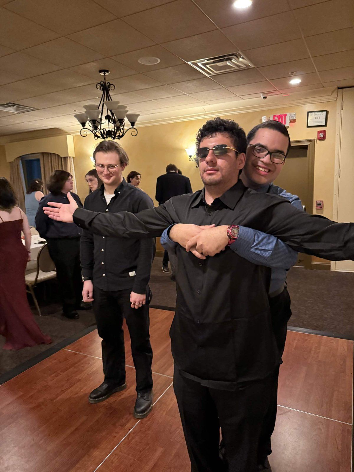Alpha Phi Omega members dressed up at the chapter Formal