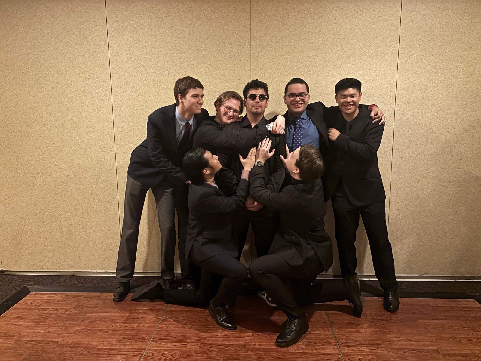 Alpha Phi Omega members dressed up at the chapter Formal