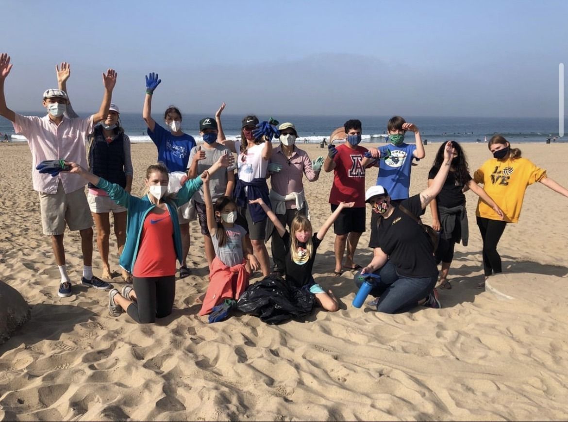 Youth group members at a beach cleanup
