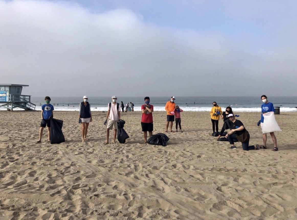 Youth group members at a beach cleanup