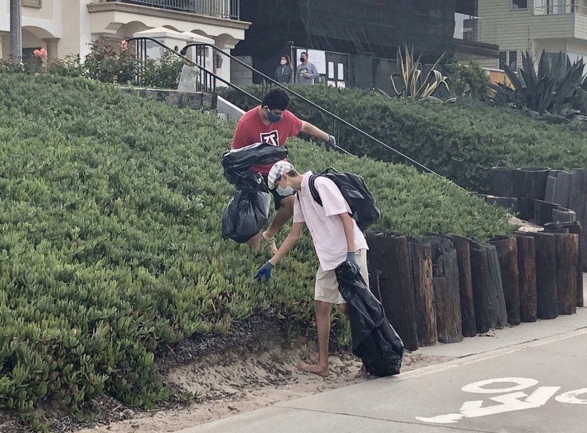 Youth group members at a beach cleanup