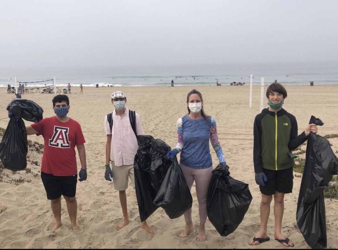 Youth group members at a beach cleanup