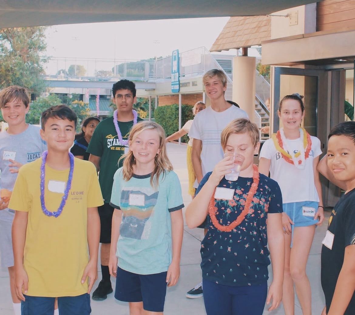 Youth group members at a luau