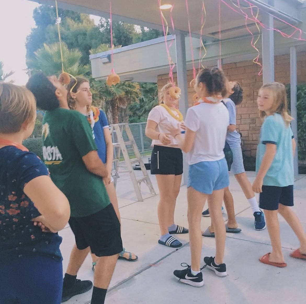 Youth group members at a luau